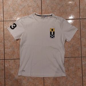 Lacoste Men's White Graphic Tee with Navy and Yellow Accents